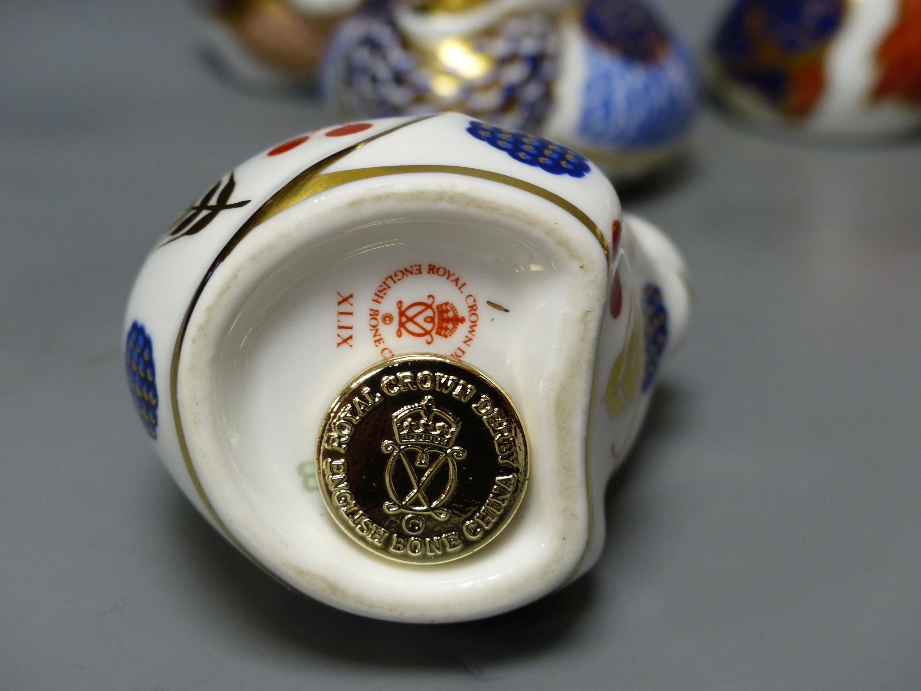 Eight Royal Crown Derby animal or bird paperweights